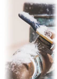 pipe frozen in snow