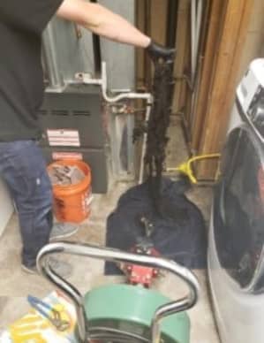 Main-drain-snake-cleaning-Aurora-80015-225x300